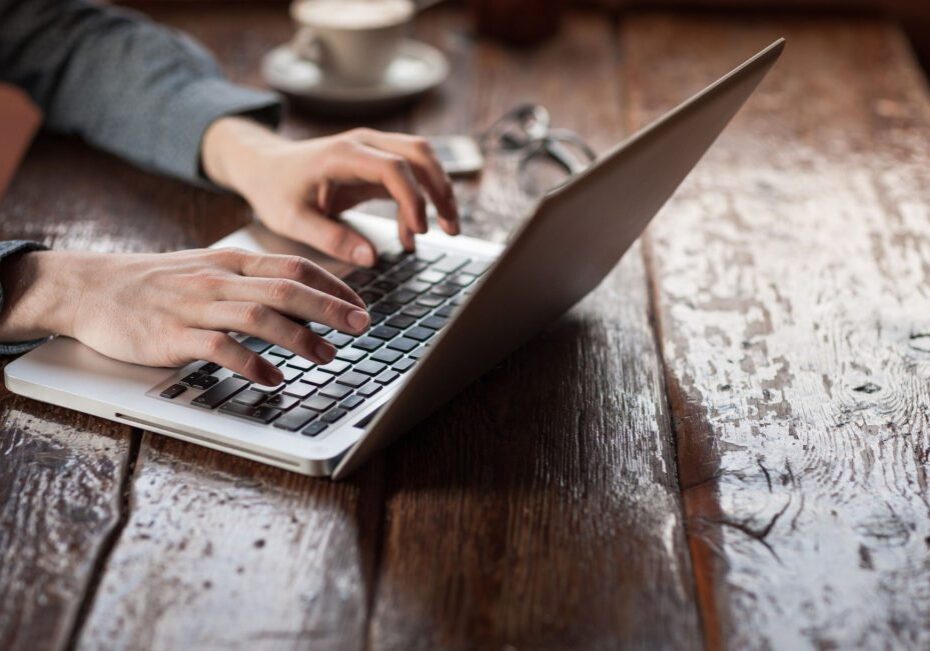 banner image of someone typing on a laptop
